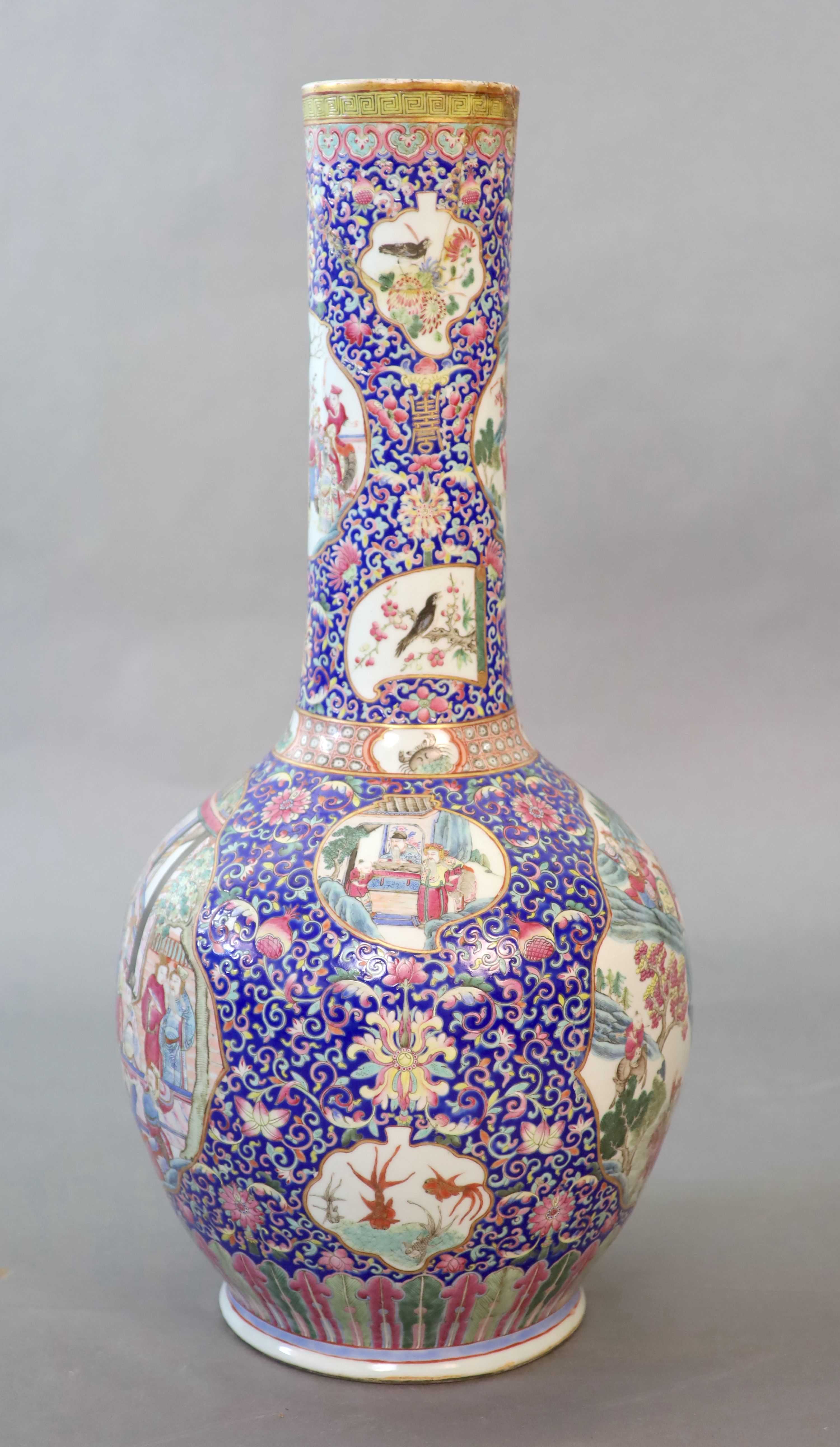 A massive Chinese blue ground bottle vase, Daoguang period (1821-50), 88cm high, neck broken and re-glued